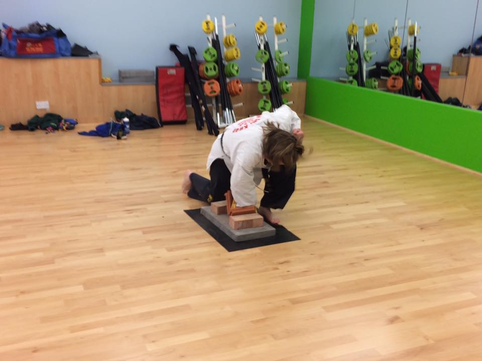 Helen Breaking Tiles Cubs